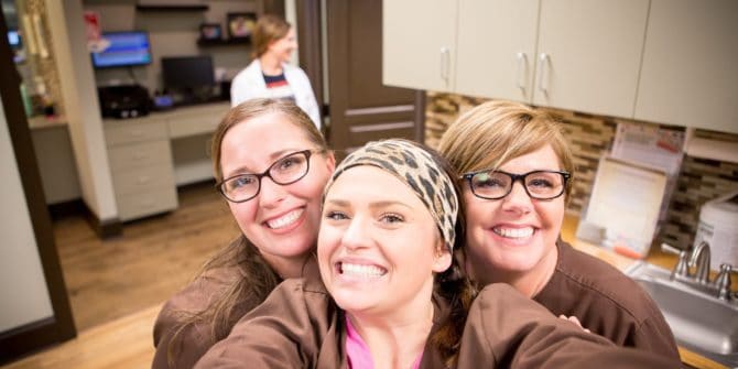 Fergus Orthodontics Jonesboro Arkansas Teams Candids 28 670x335 - Not Just Braces. Caring for patients is our passion.