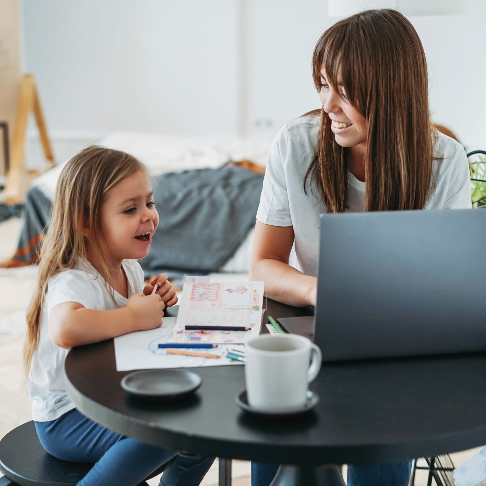 momdaughtercomputer scaled - 7 Kid Friendly Activities You Can Do At Home