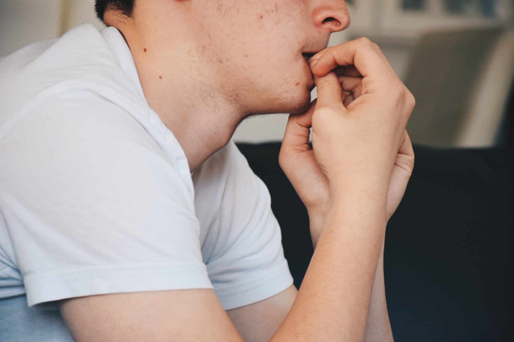 teenager feeling anxious and nervous biting nails 2021 08 30 07 01 27 utc scaled - 12 Things to Know About Braces or Invisalign
